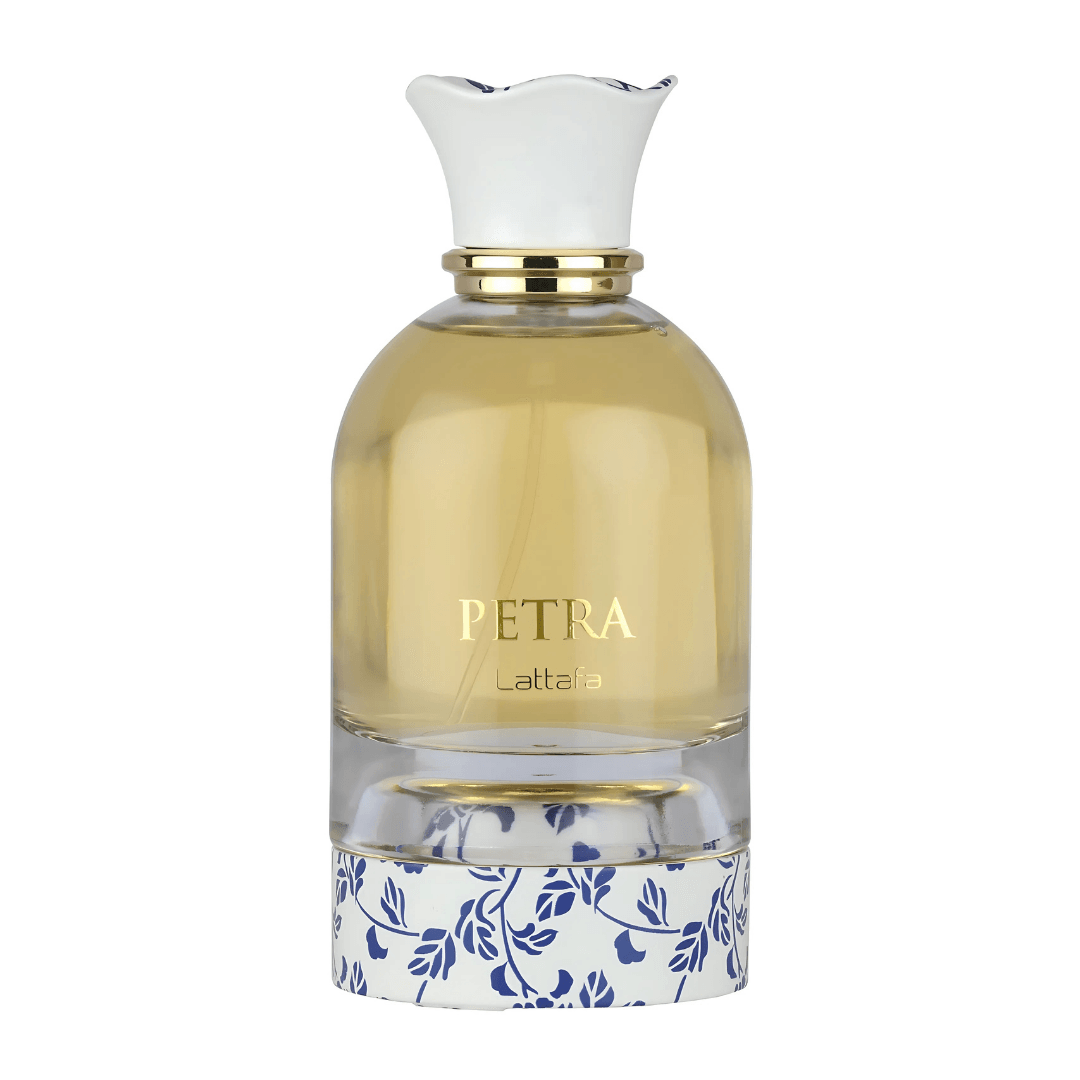 Perfume unisex Petra by Lattafa, eau de parfum exclusivo en frasco transparente con tapa blanca floral elegante.