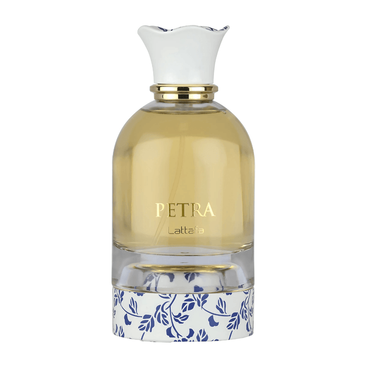 Perfume unisex Petra by Lattafa, eau de parfum exclusivo en frasco transparente con tapa blanca floral elegante.