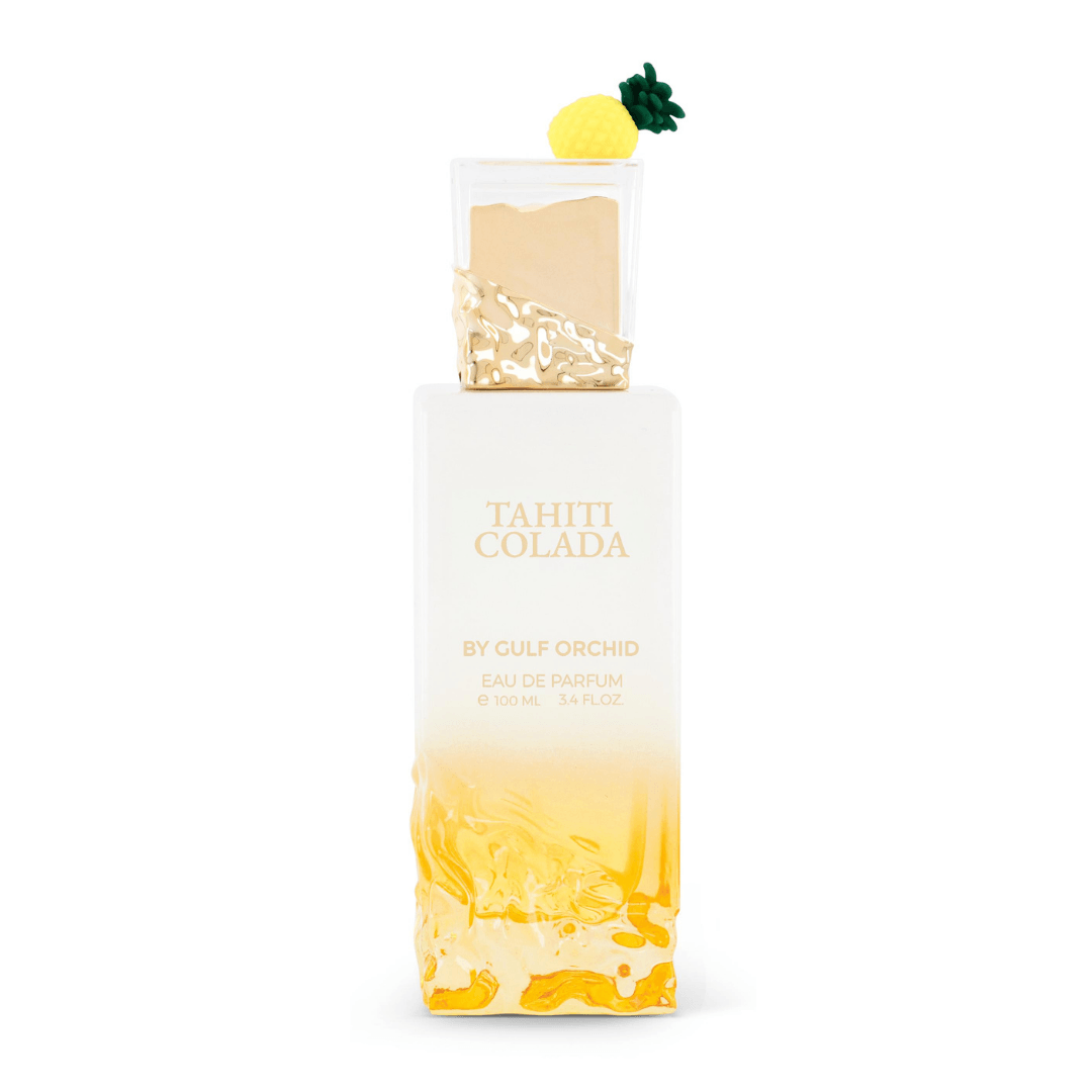 Perfume femenino Tahiti Colada by Gulf Orchid, eau de parfum tropical premium en frasco degradado blanco y amarillo con detalle de piña