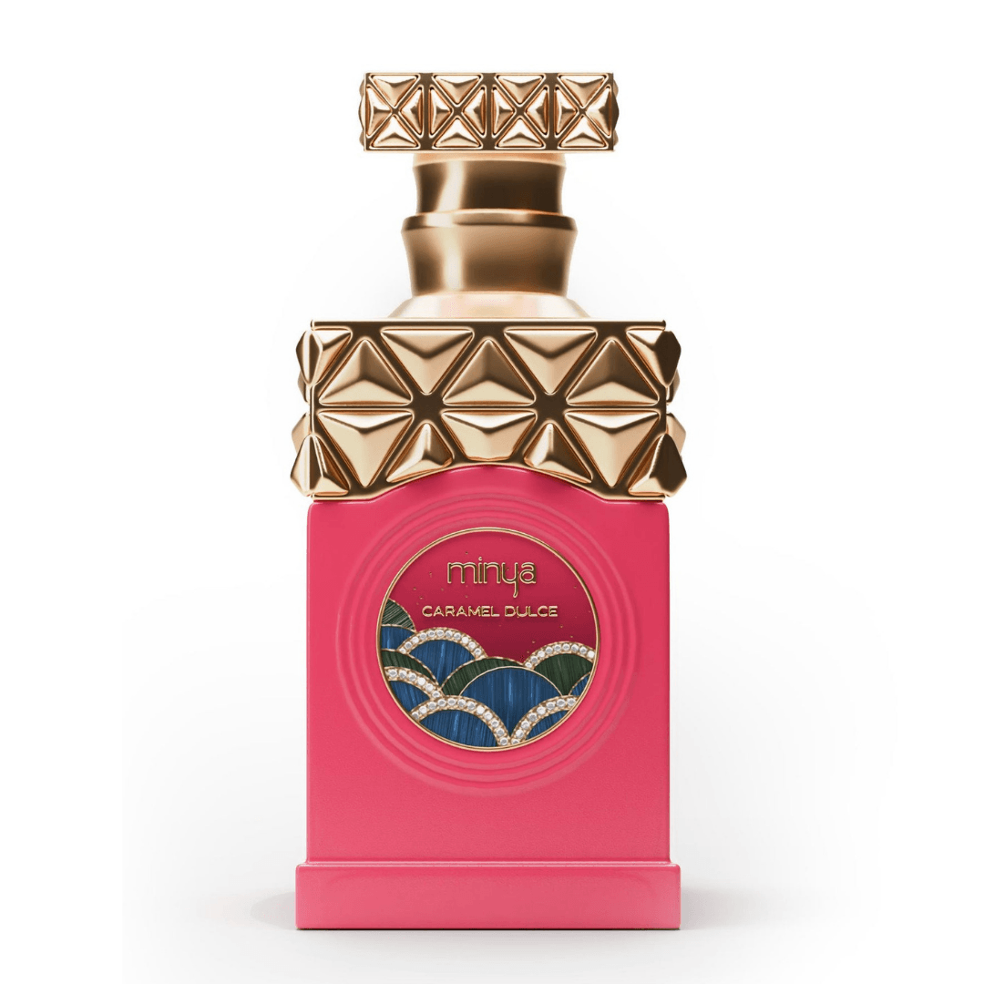 Perfume unisex Minya Caramel Dulce, eau de parfum exclusivo en frasco rosa con tapa dorada de lujo y diseño artístico.
