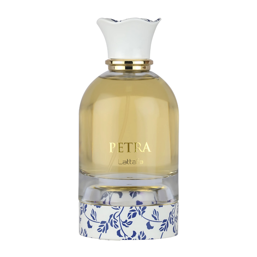 Perfume unisex Petra by Lattafa, eau de parfum exclusivo en frasco transparente con tapa blanca floral elegante.
