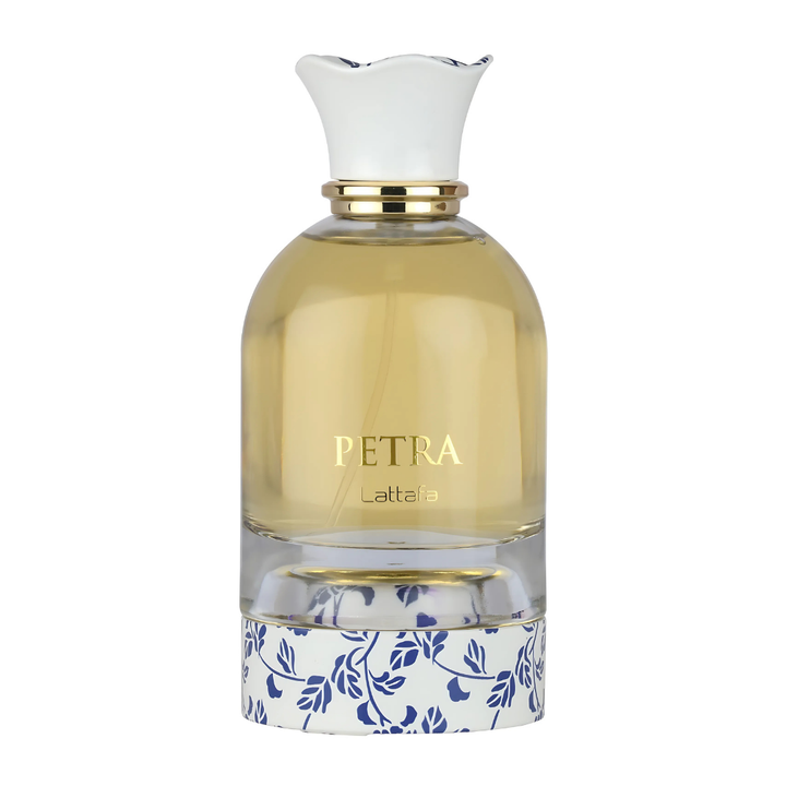 Perfume unisex Petra by Lattafa, eau de parfum exclusivo en frasco transparente con tapa blanca floral elegante.