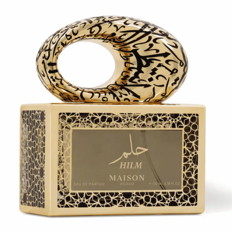frasco de perfume Hilm de Maison Asrar con diseño dorado elegante y detalles árabes